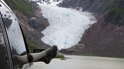 Socks out of window in front of glacier Video stock 79320056