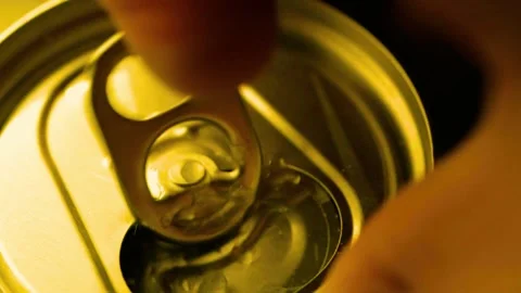 Soda can opening under yellow studio light with carbonated spray mist Stock-Footage 341969894