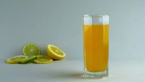 Soda put straw and lemon Stock Footage 74657052
