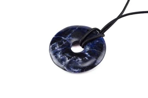 Sodalite stone donut on leather string 库存照片