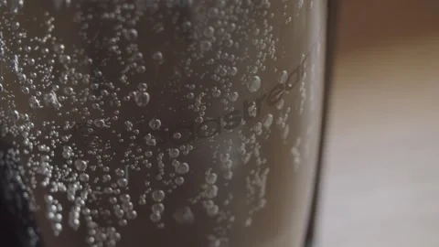 Sodastream logo on bottle with bubbles close up Stock Footage 290090223