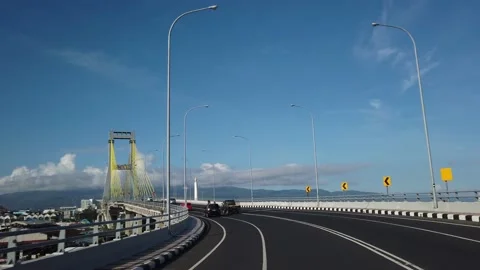 Soekarno Bridge, Iconic Cable Stayed Bridge in The Morning, Manado Stock Footage 130202981