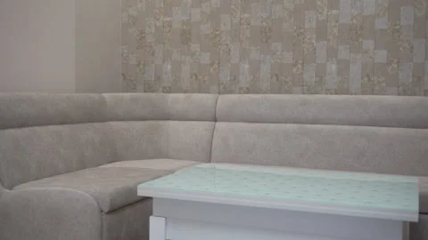 Sofa and folding coffee table in the living room Stock Footage 255400501
