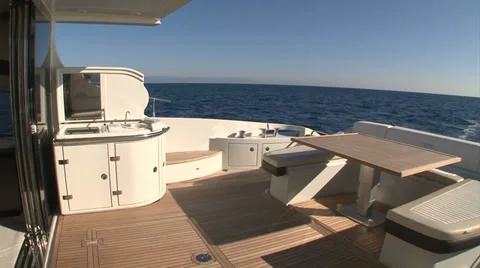 Sofa and table on main deck of luxury yacht Stock Footage 36176496
