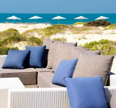 Sofa on the beach Stock Photos