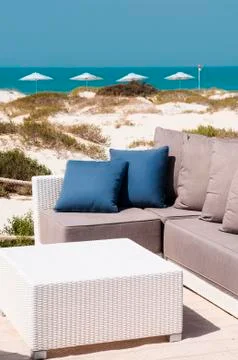 Sofa on the beach Stock Photos