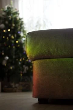 Sofa corner with Christmas tree background Stock Photos