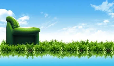 Sofa on the grass with the bright sky Stock Photos
