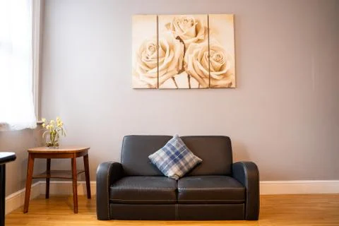 Sofa inside a small apartment Stock Photos
