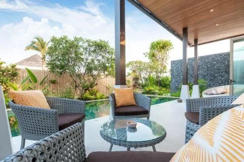 Sofa at the pool villas Stock Photos