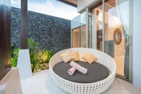 Sofa at the pool villas Stock Photos