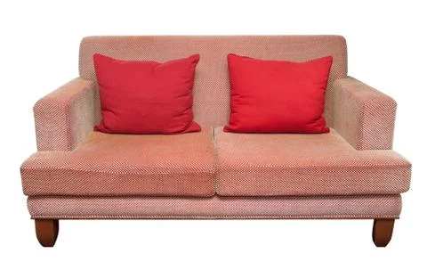 Sofa with red pillows on white background Stock Photos