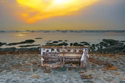 SOFA ON THE SHORE. Stock Photos