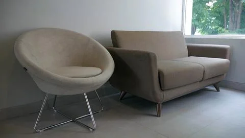 Sofa at the side of the window Foto stock