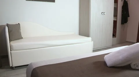 A sofa in a spacious room Stock Footage 61642123