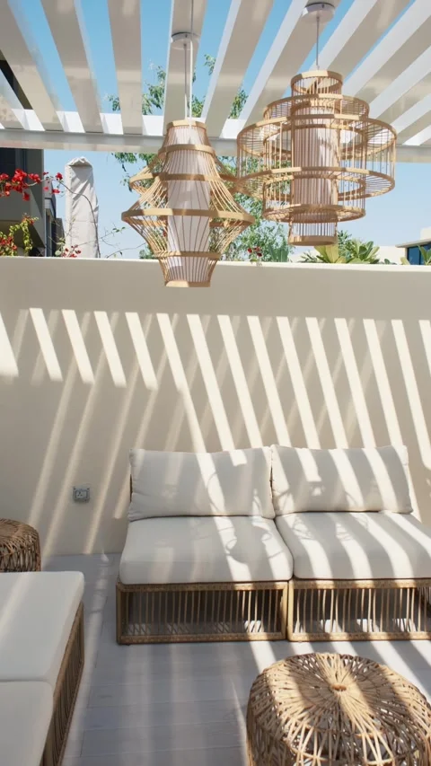 Sofa under a canopy in the backyard of a luxury villa in Dubai on a sunny day Stock Footage 310736155