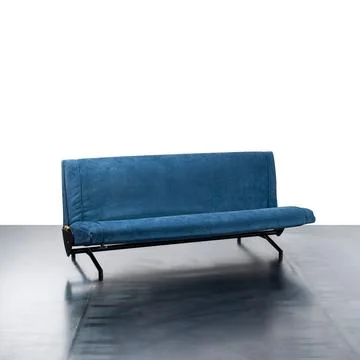 Sofa upholstered in blue fabric Stock Photos