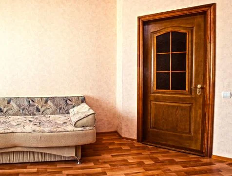 Sofa in white room Stock Photos