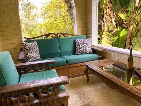 Sofas and table on a patio Stock Photos