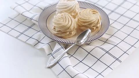 Сoffee-colored marshmallow. Sweet and braided marshmallow. Stock Footage 344834007