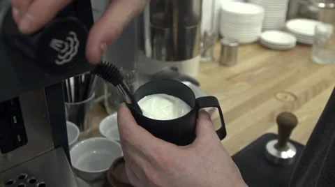 Сoffee machine steaming milk in slow motion Stock Footage 59074250