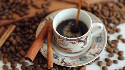 Сoffee poured into a сup Stock Footage 87847314