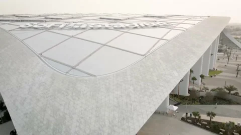 SoFi Stadium Canopy Tip to Rooftop Logo, 4K Rising View Stock Footage 148532028