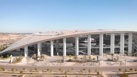 SoFi Stadium Front Columns and Entrance Plaza, Aerial Pass, 4K Stock Footage 148354749