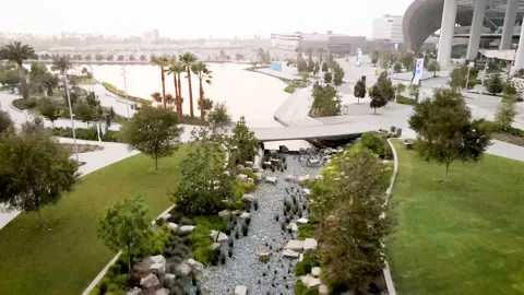SoFi Stadium Landscaped Stream and Lake, 4K Flyover Stock Footage 148532014