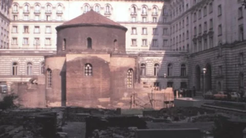 Sofia - 1981: Saint George church with historical ruins by city buildings Stock-Footage 204064467