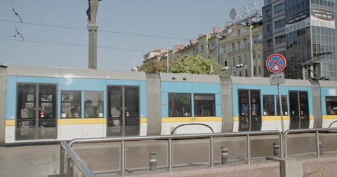 Sofia, Bulgaria - 02/16/2024: Modern tram driving through city handheld Stock Footage 264885725