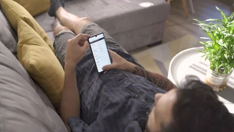 Sofia, Bulgaria-07 08 2021: Young Man using Fiverr app on smartphone Stock-Footage 158978042