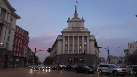Sofia, Bulgaria - 11/30/2023: Evening traffic at Nezavisimost ( translates Stock Footage 265526899
