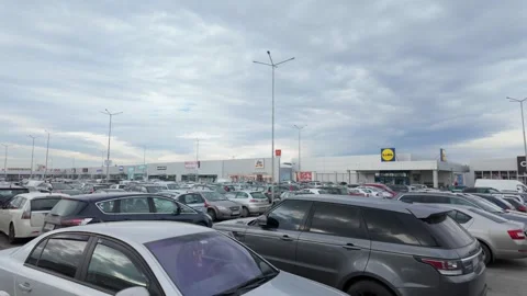 Sofia, Bulgaria - 12/01/2023: View of the busy parking lot at Jumbo Plaza Stock Footage 262723160
