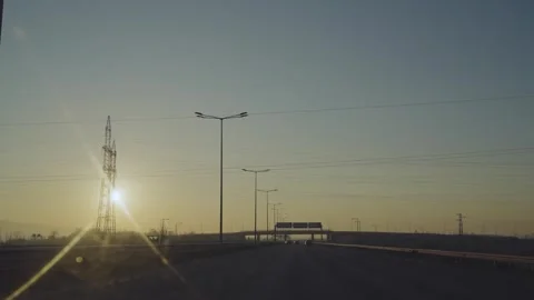 Sofia, Bulgaria - 15 Mar, 2023: Direction signs on highway drive at sunset, s Stock Footage 260341747