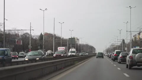 Sofia, Bulgaria - 15 Mar, 2023: POV wide angle downtown city driving on busy Stock Footage 260341845