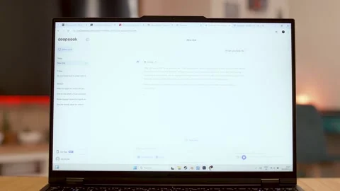 Sofia, Bulgaria-16 02 2025 : DeepSeek AI Running on Laptop in Cozy Living Room Stock Footage 306678973