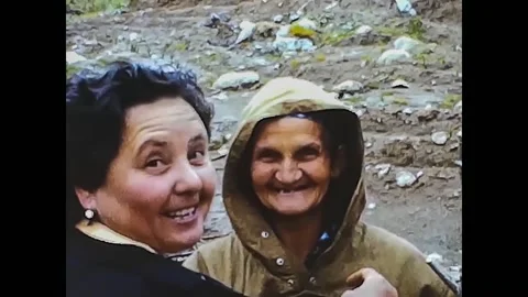 Sofia, Bulgaria, 1963 - In the countryside an old woman jokes with her workmates 库存影片 191864029
