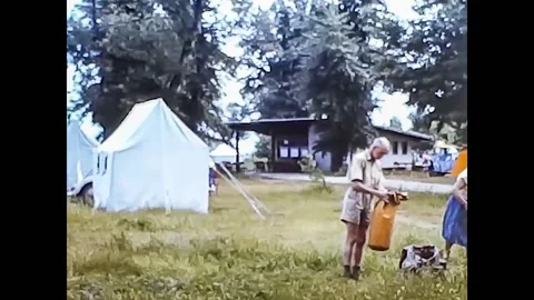 Sofia, Bulgaria, 1963 - Two tourists prepare to leave at a campsite Видео 191859722
