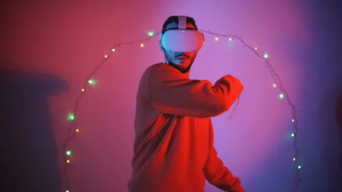 Sofia, Bulgaria - 22 11 2020: Man playing beat saber on oculus quest 2 Stock Footage 143639101