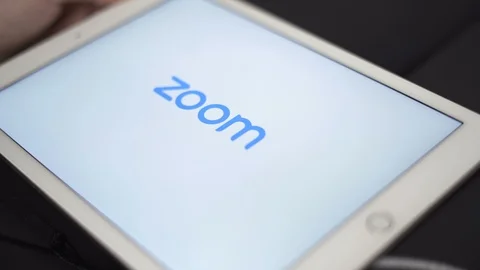 Sofia, Bulgaria-23 03 2020: Close up of Zoom app starting on iPad tablet. Zoom Stock Footage 127182478