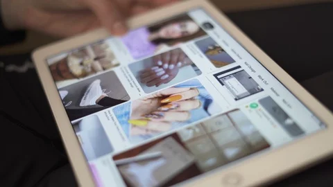 Sofia, Bulgaria-23 03 2020: Close up of female hands using Pinterest app for Stock Footage 127182638