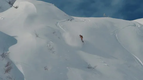 Sofia, Bulgaria 23 February 2017: Freestyle snowboarder charges down the mountai Stock Footage 141908323