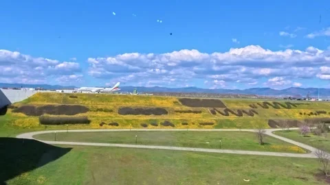 Sofia, Bulgaria - 4.05.2026. Panorama of Sofia Airport with runway and planes Stock Footage 332375980