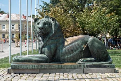 Sofia, Bulgaria, August 19, 2023: Statue Bronze Lion next to St. Sofia Church Stock Photos