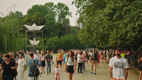 SOFIA, BULGARIA - AUGUST 29, 2026: Large crowd walking near giant paper boat 動画素材 345900638