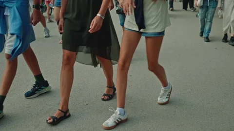 SOFIA, BULGARIA - AUGUST 29, 2026: Low angle shot of people legs walking and Stock-Footage 345900658