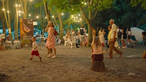 SOFIA, BULGARIA - AUGUST 29, 2026: People enjoying outdoor evening atmosphere Stock-Footage 345900821