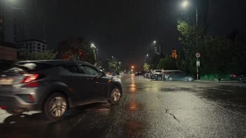 SOFIA, BULGARIA - AUGUST 29, 2026: Cars driving on wet asphalt during rain and 動画素材 345901050