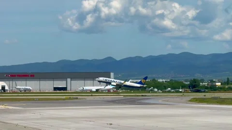 Sofia, Bulgaria - June 08, 2026: Ryanair aircraft lifts off from the runway, asc Stock Footage 341692212